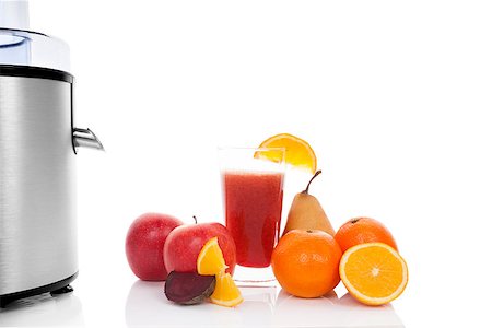 simsearch:400-08977333,k - Fresh fruit juicing. Silver juicer, fresh fruit and fresh juice in glass isolated on white background. Healthy refreshing summer drink. Stock Photo - Budget Royalty-Free & Subscription, Code: 400-07922737