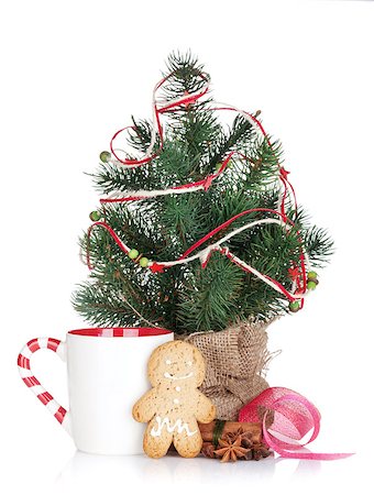 Christmas mulled wine with fir tree, gingerbread and decor. Isolated on white background Stock Photo - Budget Royalty-Free & Subscription, Code: 400-07922797