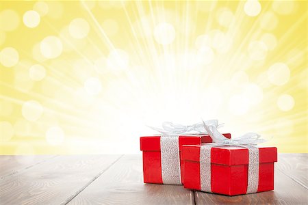 simsearch:400-07921368,k - Christmas gift boxes on wooden table with bokeh background for copy space Stock Photo - Budget Royalty-Free & Subscription, Code: 400-07922832