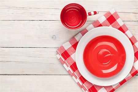 simsearch:400-04895787,k - Empty plate, cup and towel over wooden table background. View from above with copy space Stock Photo - Budget Royalty-Free & Subscription, Code: 400-07922882