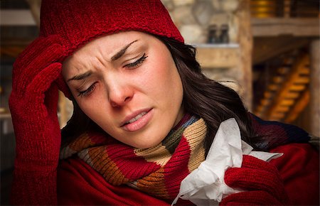 simsearch:400-06462603,k - Bundled Up Sick Woman Inside Cabin With Tissue. Stock Photo - Budget Royalty-Free & Subscription, Code: 400-07923171