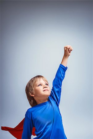 superman - Boy in suit a superman in studio Stock Photo - Budget Royalty-Free & Subscription, Code: 400-07923608