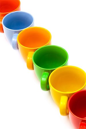 Beautiful color cups on a white background Fotografie stock - Microstock e Abbonamento, Codice: 400-07923875