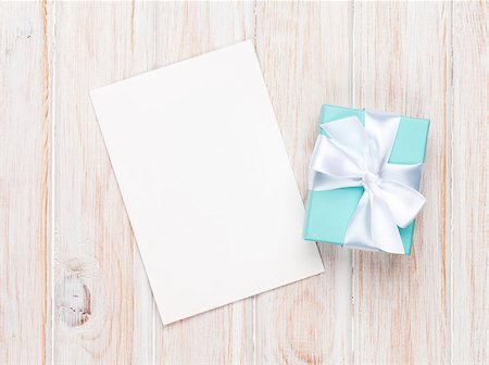 Valentines day gift box and greeting card on white wooden table with copy space Stock Photo - Budget Royalty-Free & Subscription, Code: 400-07934014