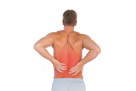 Shirtless man suffering from lower back pain on white background Photographie de stock - Aubaine LD & Abonnement, Code: 400-07934304