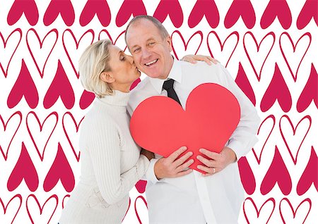 simsearch:400-07957212,k - Older affectionate couple holding red heart shape against valentines day pattern Stock Photo - Budget Royalty-Free & Subscription, Code: 400-07934568