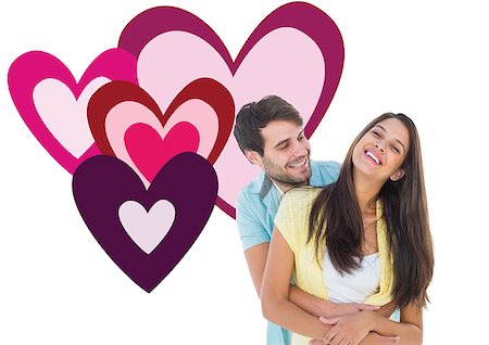 simsearch:400-07957805,k - Happy casual couple smiling and hugging against valentines love hearts Photographie de stock - Aubaine LD & Abonnement, Code: 400-07934577