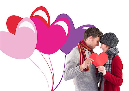 simsearch:400-07957006,k - Couple holding a red heart against valentines love hearts Stock Photo - Budget Royalty-Free & Subscription, Code: 400-07934581