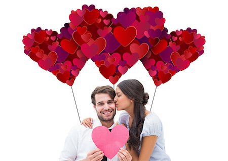 simsearch:400-07957006,k - Pretty brunette giving boyfriend a kiss and her heart against valentines day Stock Photo - Budget Royalty-Free & Subscription, Code: 400-07934605