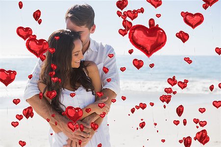 floating balloon woman caucasian - Loving couple cuddling against red heart balloons floating Stock Photo - Budget Royalty-Free & Subscription, Code: 400-07934803