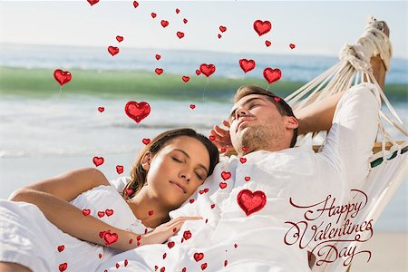 Peaceful couple napping in a hammock against happy valentines day Stock Photo - Budget Royalty-Free & Subscription, Code: 400-07934833