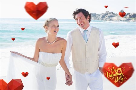 simsearch:400-07664797,k - Newlyweds walking hand in hand and laughing against happy valentines day Stock Photo - Budget Royalty-Free & Subscription, Code: 400-07934948