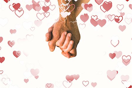 simsearch:400-07957006,k - Happy senior couple holding hands against valentines heart design Stock Photo - Budget Royalty-Free & Subscription, Code: 400-07935022