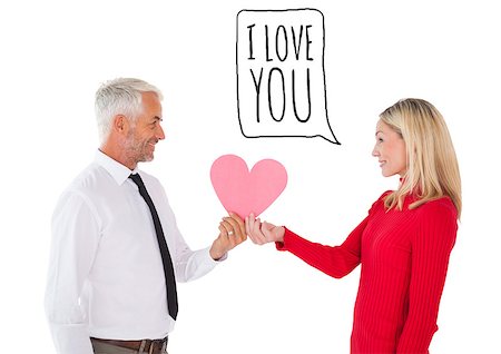 person words speech bubble not phone not outdoors - Handsome man getting a heart card form wife against i love you Stock Photo - Budget Royalty-Free & Subscription, Code: 400-07935322