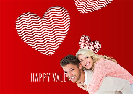 simsearch:400-07935196,k - Handsome man giving piggy back to his girlfriend against cute valentines message Foto de stock - Royalty-Free Super Valor e Assinatura, Número: 400-07935345