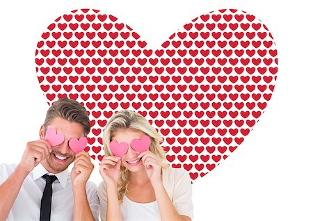 simsearch:400-07957006,k - Attractive young couple holding pink hearts over eyes against valentines day pattern Stock Photo - Budget Royalty-Free & Subscription, Code: 400-07935361