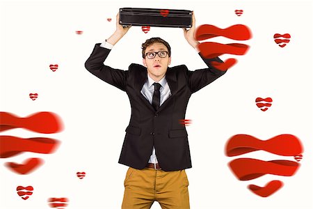 simsearch:400-08020381,k - Young geeky businessman holding briefcase against hearts Fotografie stock - Microstock e Abbonamento, Codice: 400-07935772