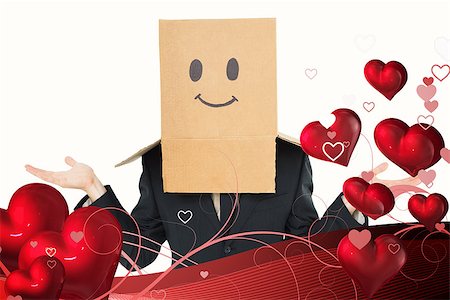 simsearch:400-07957212,k - Businessman shrugging with box on head  against valentines heart design Stock Photo - Budget Royalty-Free & Subscription, Code: 400-07935882