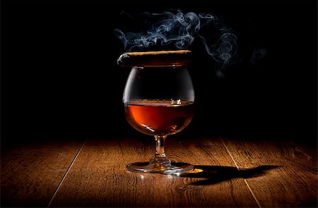 Havana cigar on a wineglass of whiskey Stock Photo - Budget Royalty-Free & Subscription, Code: 400-07936316