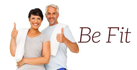 exercise for women over 50 years old - Portrait of a happy fit couple gesturing thumbs up over white background Stock Photo - Budget Royalty-Free & Subscription, Code: 400-07936595