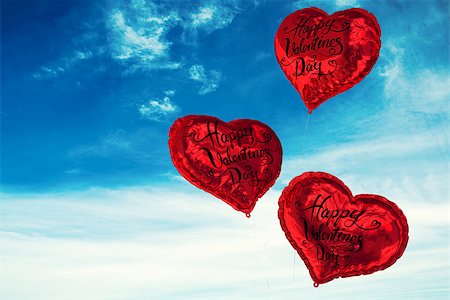 simsearch:400-07936959,k - Happy valentines day against blue sky Foto de stock - Royalty-Free Super Valor e Assinatura, Número: 400-07936940