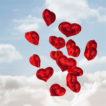 simsearch:400-07936959,k - Heart balloons against cloudy sky Foto de stock - Royalty-Free Super Valor e Assinatura, Número: 400-07936956