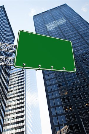 simsearch:400-07525974,k - The word a new you and green billboard sign against low angle view of skyscrapers Stock Photo - Budget Royalty-Free & Subscription, Code: 400-07937351