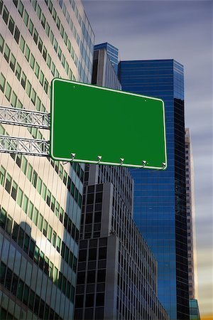 simsearch:400-07525974,k - The word a new you and green billboard sign against low angle view of skyscrapers Stock Photo - Budget Royalty-Free & Subscription, Code: 400-07937352