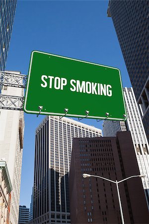 stop sign smoke - The word stop smoking and green billboard sign against new york Stock Photo - Budget Royalty-Free & Subscription, Code: 400-07937361