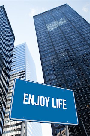 simsearch:400-07525974,k - The word enjoy life and blue billboard against low angle view of skyscrapers Stock Photo - Budget Royalty-Free & Subscription, Code: 400-07937377