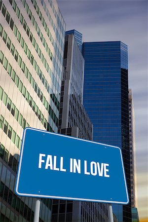 simsearch:400-07525974,k - The word fall in love and blue billboard against low angle view of skyscrapers Stock Photo - Budget Royalty-Free & Subscription, Code: 400-07937383