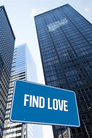 simsearch:400-07525974,k - The word find love and blue billboard against low angle view of skyscrapers Stock Photo - Budget Royalty-Free & Subscription, Code: 400-07937392