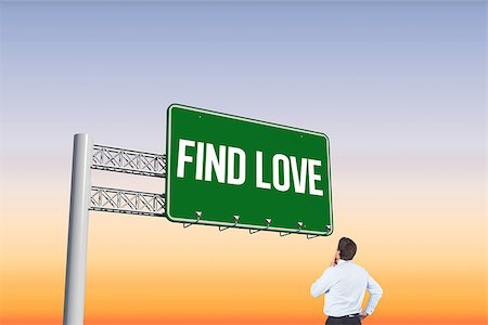 The word find love and thinking businessman touching his chin against purple and orange sky Stock Photo - Budget Royalty-Free & Subscription, Code: 400-07937433