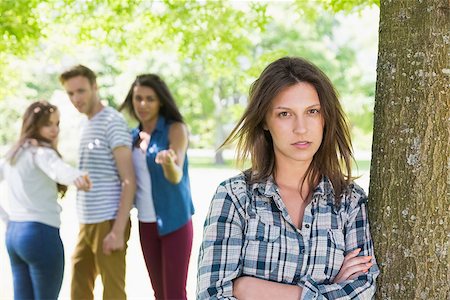 Lonely student being bullied by her peers at the university Stock Photo - Budget Royalty-Free & Subscription, Code: 400-07938382
