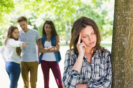 Lonely student being bullied by her peers at the university Stock Photo - Budget Royalty-Free & Subscription, Code: 400-07938383