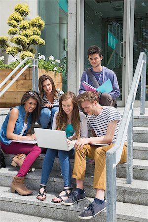 simsearch:400-07939821,k - Students sitting on steps studying at the university Photographie de stock - Aubaine LD & Abonnement, Code: 400-07938401