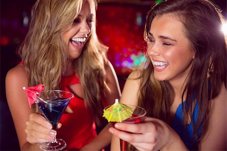 pretty woman laughter party - Pretty friends drinking cocktails together at the nightclub Stock Photo - Budget Royalty-Free & Subscription, Code: 400-07938480