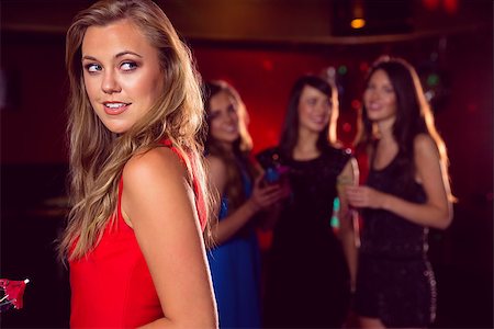 simsearch:649-06844392,k - Pretty girl drinking a cocktail at the nightclub Stock Photo - Budget Royalty-Free & Subscription, Code: 400-07938515