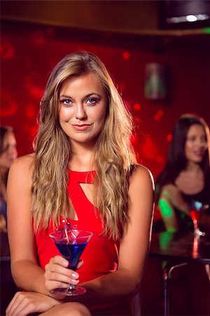 simsearch:400-04040205,k - Pretty blonde drinking a cocktail at the nightclub Stock Photo - Budget Royalty-Free & Subscription, Code: 400-07938547