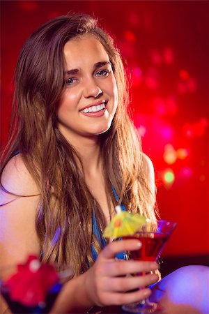 simsearch:400-04040205,k - Pretty girl drinking a cocktail at the nightclub Stock Photo - Budget Royalty-Free & Subscription, Code: 400-07938543