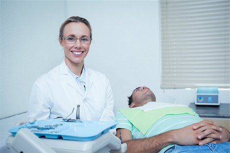 Portrait of smiling female dentist Stock Photo - Budget Royalty-Free & Subscription, Code: 400-07939216