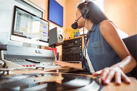 Portrait of an university student mixing audio in a studio of a radio Stock Photo - Budget Royalty-Free & Subscription, Code: 400-07939613