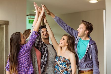 Happy friends students high five for their teamwork at school Stock Photo - Budget Royalty-Free & Subscription, Code: 400-07939747