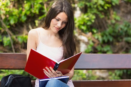 simsearch:400-07939821,k - Pretty student studying outside on campus at the university Photographie de stock - Aubaine LD & Abonnement, Code: 400-07939748