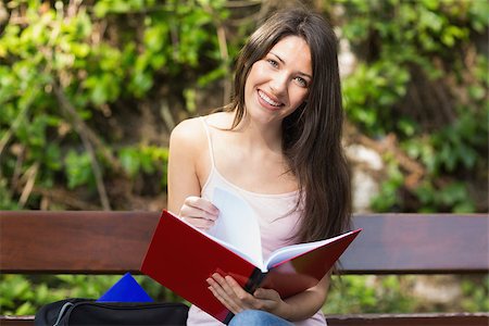 simsearch:400-07939821,k - Pretty student studying outside on campus at the university Photographie de stock - Aubaine LD & Abonnement, Code: 400-07939749