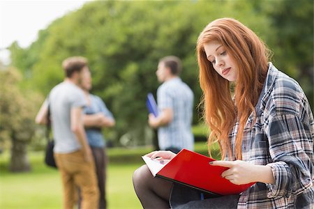 simsearch:400-07939821,k - Pretty student studying outside on campus at the university Photographie de stock - Aubaine LD & Abonnement, Code: 400-07939824