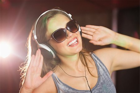 deejay (female) - Pretty dj smiling and dancing at the nightclub Stock Photo - Budget Royalty-Free & Subscription, Code: 400-07939971