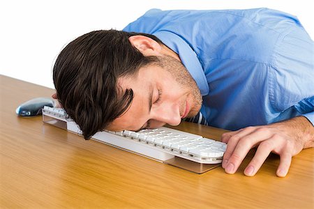 simsearch:693-03644020,k - Businessman sleeping with his head on the keyboard on white background Photographie de stock - Aubaine LD & Abonnement, Code: 400-07930053