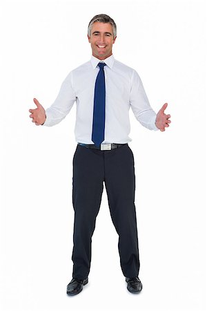 simsearch:400-04861869,k - Happy businessman without jacket with arms out on white background Foto de stock - Royalty-Free Super Valor e Assinatura, Número: 400-07930437