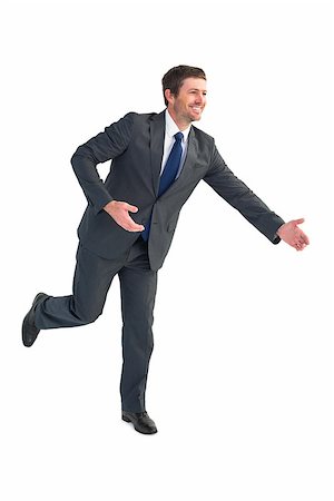 simsearch:400-08264445,k - Businessman walking with his hands out on white background Stock Photo - Budget Royalty-Free & Subscription, Code: 400-07930823